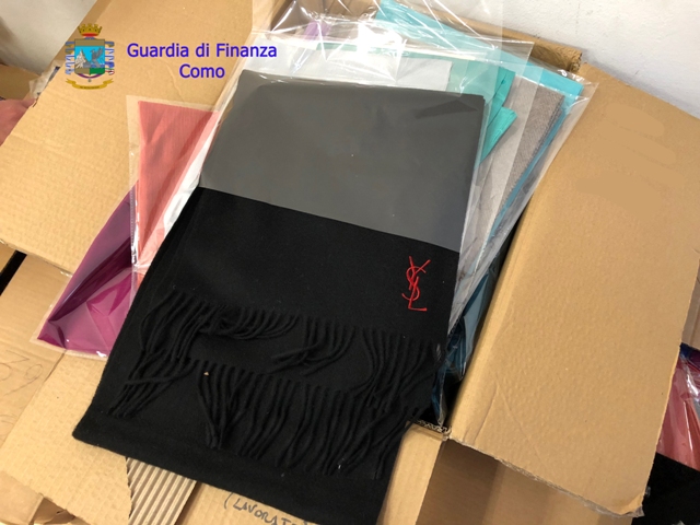 Guardia di finanza: maxi sequestro di capi d’abbigliamento contraffatti, coinvolte due società comasche